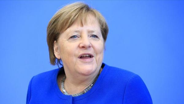 Merkel&#039;den kurallara uyun çağrısı